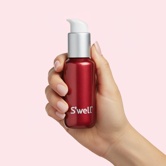 travel-bottle-set-j1 Swell_Cherry_Shimmer_Travel_Bottle_Front_Shimmer_Hand.jpg