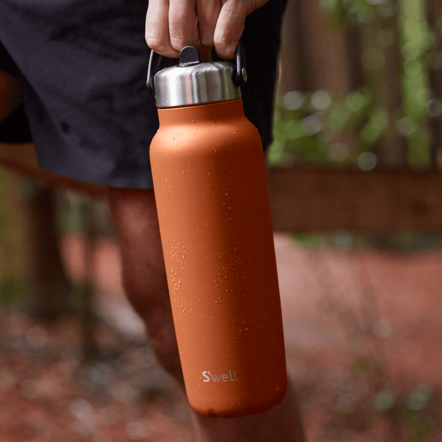 explorer-with-flip-straw-lid-40oz-n6 Swell-Explorer-Water-Bottle-40oz-Orange-Carnelian-LifeStyle.png