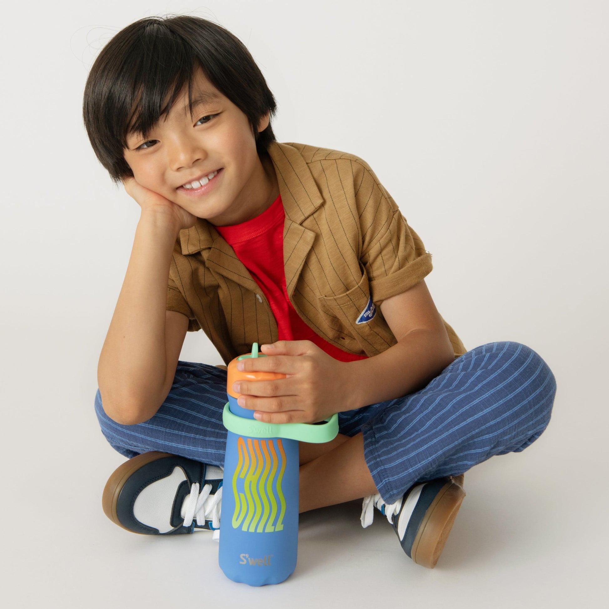 traveler-with-flip-straw-lid-16oz-m5 Swell-Kids-Water-Bottle-Traveler-16oz-Blue-Chill-Lifestyle.jpg